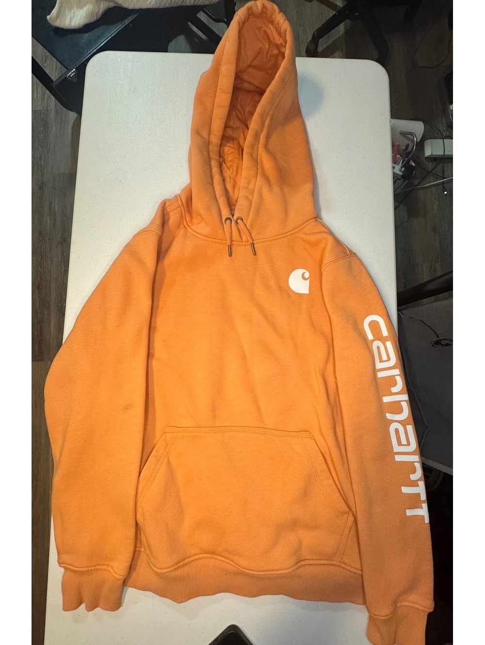 Carhartt women’s hoodie (spot on arm)